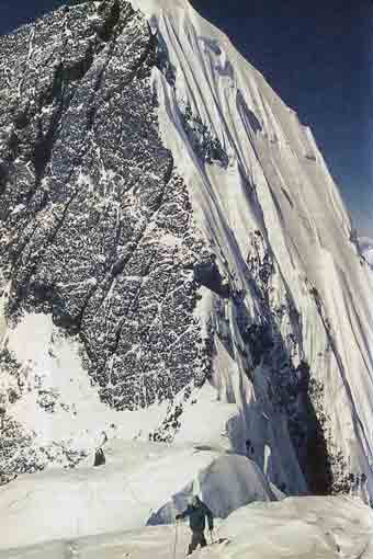 
Broad Peak First Ascent Central Summit 1975 - Broad Peak Central Peak Towers Behind Marcus Schmuck Climbing To Forepeak On June 9 1957 - Broad Peak By Richard Sale
